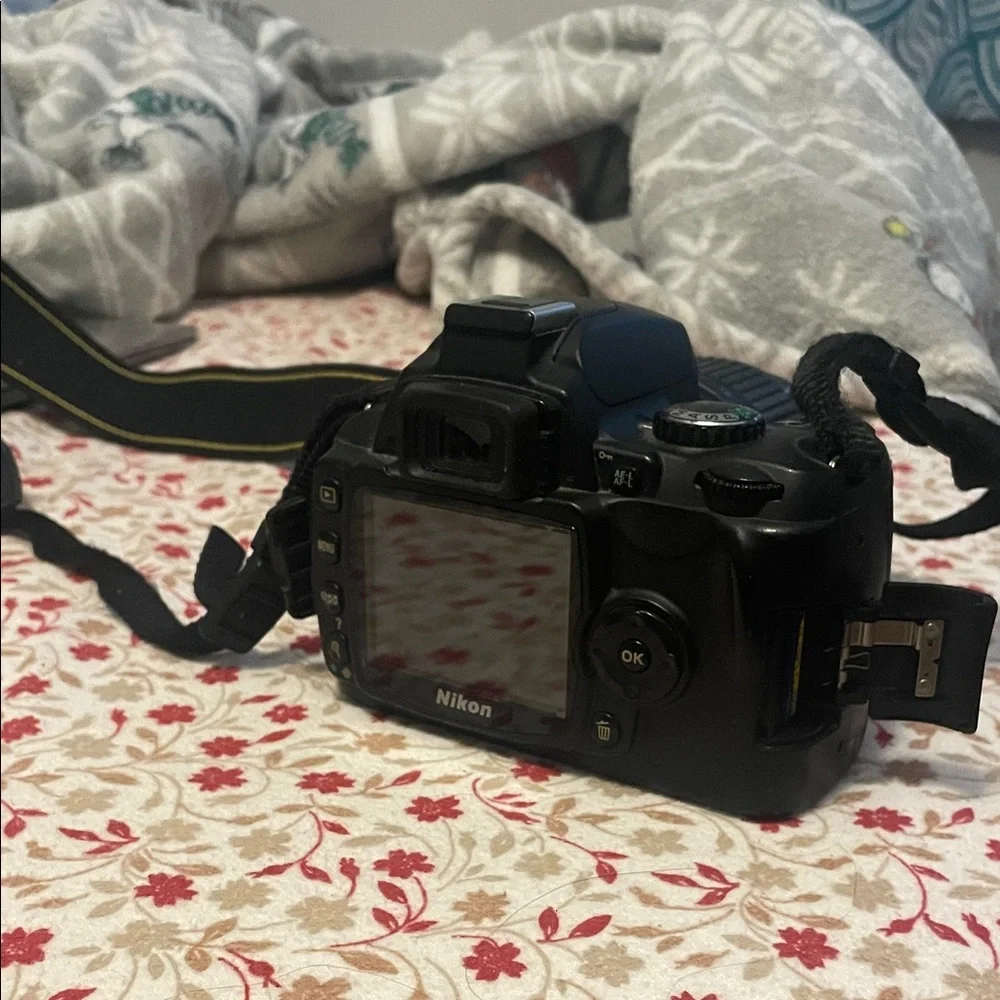 Nikon Black DSLR with Lens